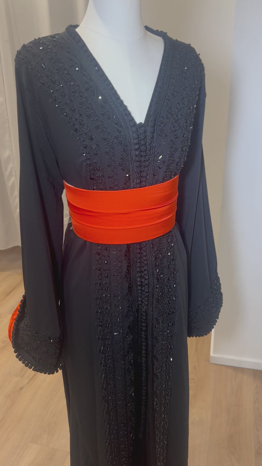 Takshita noire et rouge